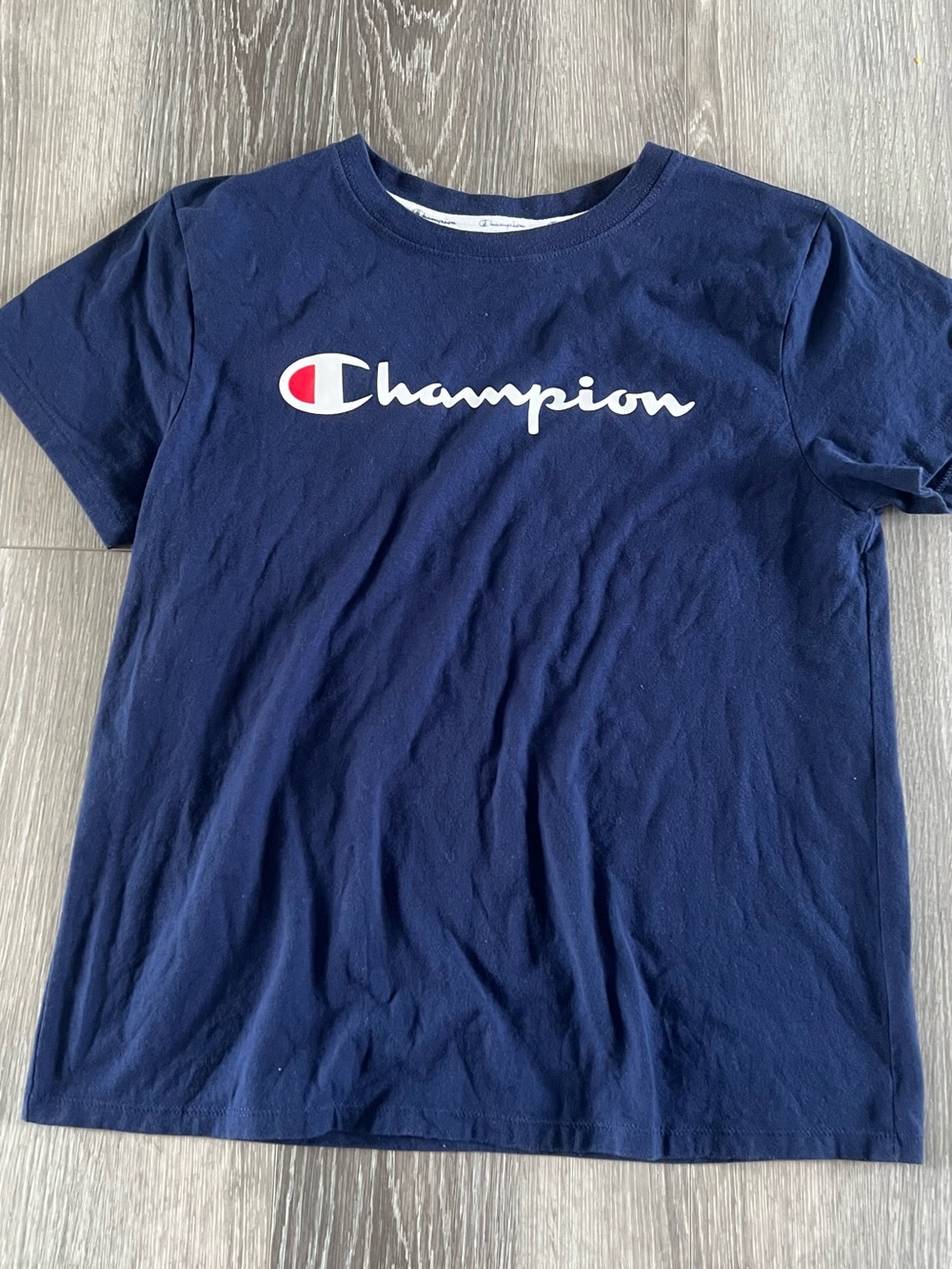 Champion Navy Short-Sleeve Tee with White Script and Red Logo Accent
